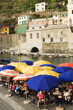 Group of people at a sidewalk cafe, Italian Riviera, Cinque Terre National Park, Il Porticciolo, Vernazza, La Spezia, Liguria, Italy