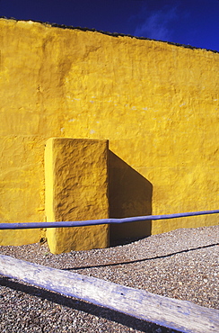 Close-up of a pipe in front of a wall