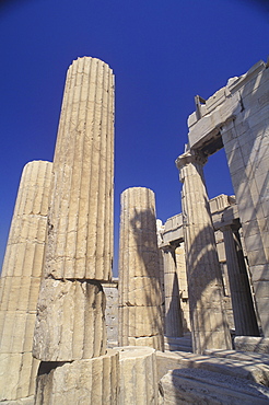 Low angle view of columns at an old ruin, Parthenon, Athens, Greece