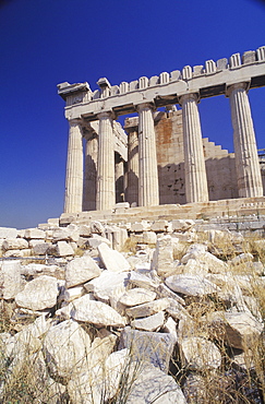 Low angle view of old ruin colonnades, Parthenon, Athens, Greece