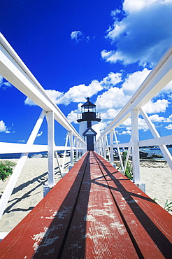 Boardwalk leading to a lighthouse, Cape Cod, Massachusetts, USA 