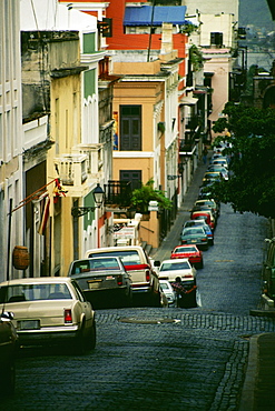 A queue of cars along the buildings, San Juan, Puerto Rico