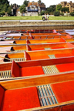 High angle view of red punts arranged in a row, Cambridge, England