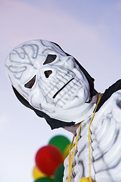 Low angle view of a man wearing a mask