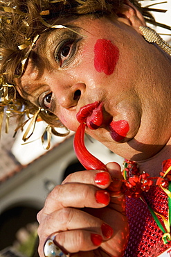 Low angle view of a mature man puckering his lips