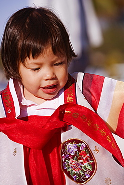 Close-up of a girl looking down