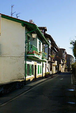 Empty street in front of residential buildings, Spain