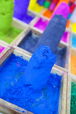 Close-up of mounds of colored powder used for Hindu rituals, Pushkar, Rajasthan, India