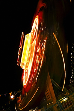 Ride in an amusement park at night, San Diego, California, USA