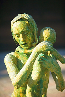 Close-up of the sculpture of a woman with her baby