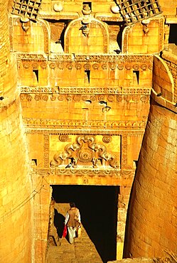 High angle view of a man entering a gate of a fort, Golden Fort, Jaisalmer, Rajasthan, India