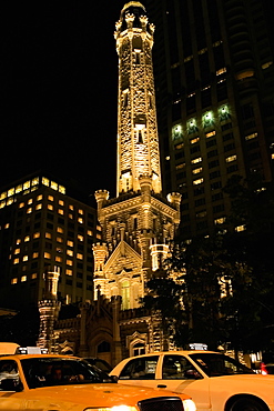 Tower lit up at night, Water Tower Chicago, Illinois, USA