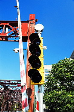 Low angle view of traffic lights on the bridge