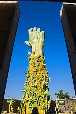 Low angle view of a sculptured human hand
