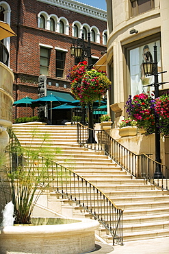 Low angle view of a staircase outside shops, Rodeo Drive, Los Angeles, California, USA