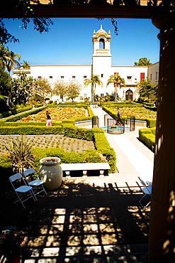 Panoramic view of the facade of an ethnic building, Alcazar Garden, Balboa Park, San Diego, California, USA