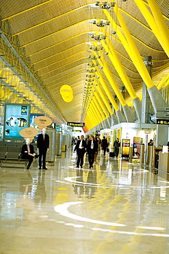 Group of people inside a terminal, Madrid, Spain