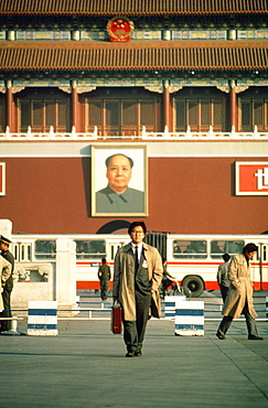 Businessman walking in front of a palace, Tiananmen Gate Of Heavenly Peace, Tiananmen Square, Beijing, China