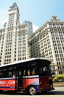 Bus parked in front of a building, Wrigley Building, Chicago, Illinois, USA