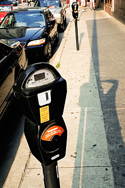 High angle view of parking meters on a sidewalk, Chicago, Illinois, USA