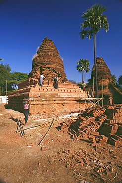 Manual workers repairing a pagoda, Bagan, Myanmar