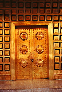 Closed golden door of a bank, Yangon, Myanmar