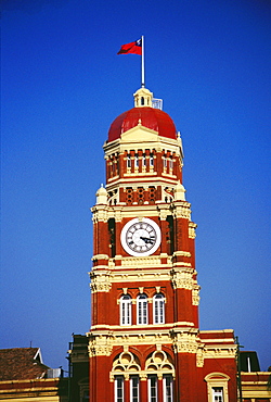 Low angle view of a clock tower of a government building, Supreme Court, Yangon, Myanmar