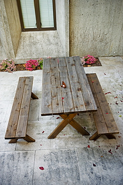 High angle view of two benches and a table