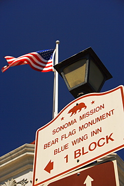 Close-up of a sign board on a lamppost, California, USA