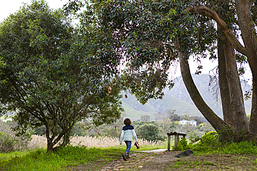 young boy walking near Klein River, Stanford, Western Cape, South Africa