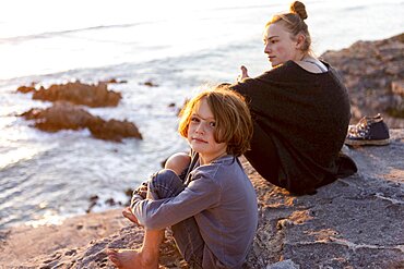 teenage girl and young brother at sunset, Walker Bay Reserve, South Africa, Walker Bay Nature Reserve, South Africa