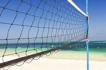 Volleyball net on a sandy beach