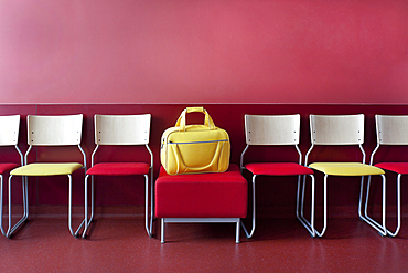 Corridor and waiting areas of a modern hospital with seating Yellow bag.