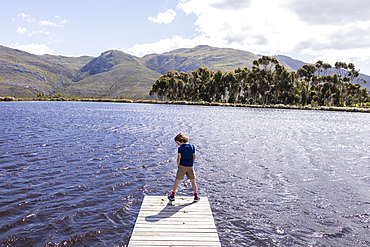 Children on boat launch, Stanford Valley Guest Farm, Stanford, Western Cape, South Africa.