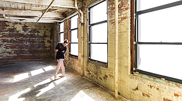 Ballerina in a rehearsal room