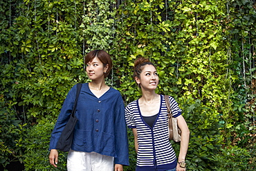 Two women standing side by side, Osaka, Japan