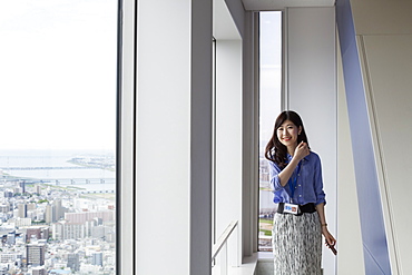 A working woman in an office building, Sakai City, Osaka, Japan