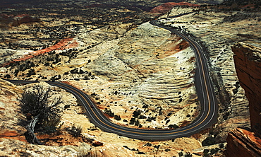 View from above of a winding road through the Utah desert landscapeWinding highway, Utah, USA
