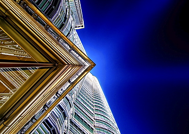 Low angle close up of architectural detail on Petronas Towers in Kuala Lumpur, Malaysia at night, Kuala Lumpur, Malaysia