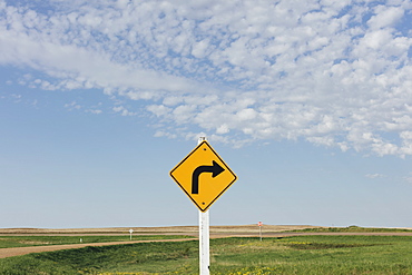 Caution turn ahead sign, near Scotsguard, Saskatchewan, Canada