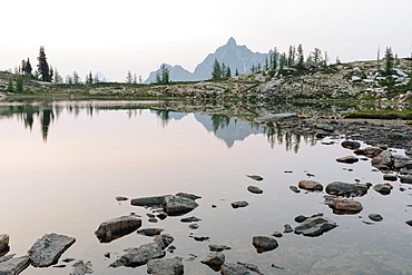 Alpine lake at dusk, Snowy Lakes, along the Pacific Crest Trail, North Cascades, Washington, United States of America