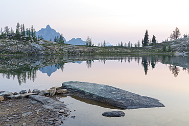 Alpine lake at dusk, Snowy Lakes, along the Pacific Crest Trail, North Cascades, Washington, United States of America