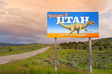 Dinosaur on Welcome to Utah sign along road, Utah, United States, Utah, United States of America