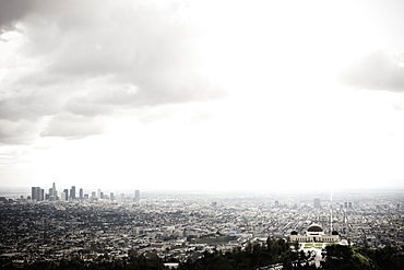 Los Angeles Skyline and Griffith Observatory Beneath Cloudy Sky, Los Angeles, California, United States of America