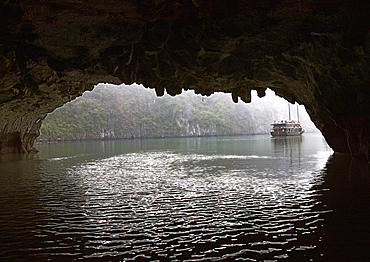 Chinese Junk Seen Through a Cave Entrance, Halong Bay, Quang Ninh, Vietnam