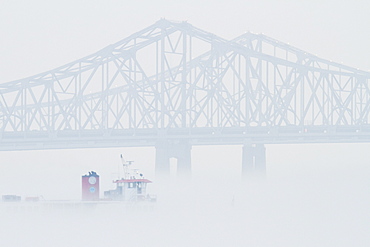 Bridge and Boat in Fog, New Orleans, Louisiana, USA