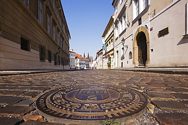 Manhole Cover on a Street in Hradcany, Prague, Czech Republic