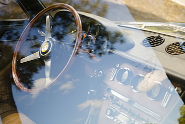 Vintage Ferrari dashboard viewed through window, Virginia Beach, Virginia, USA