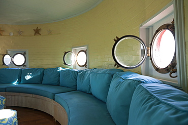 Port hole windows in round lighthouse living room, Newport News, Virginia, USA