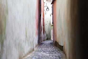 Streetlights hanging in alley, Brasov, Hungary, Hungary